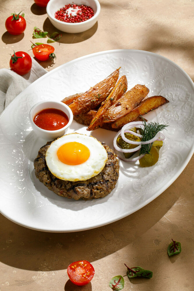 Lamb steak with potatoes rustic