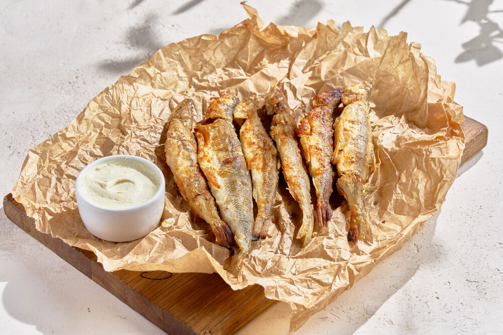 Fried smelt with baked potatoes