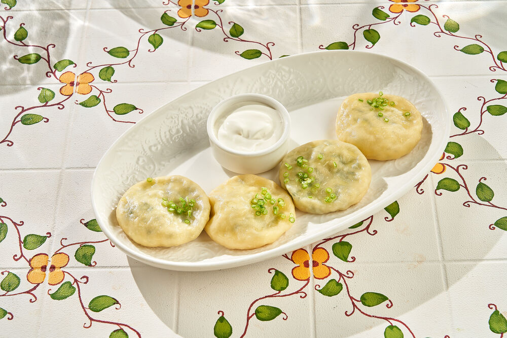 Kvari with homemade cheese and herbs