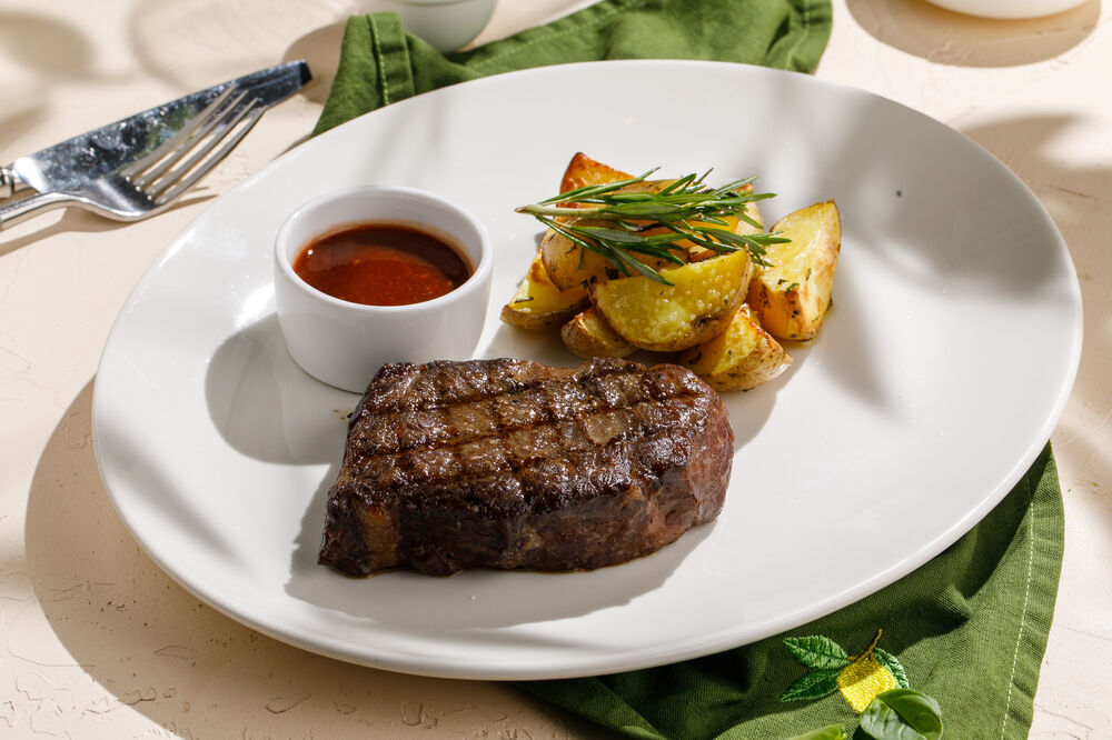 Bavet steak with baked potatoes