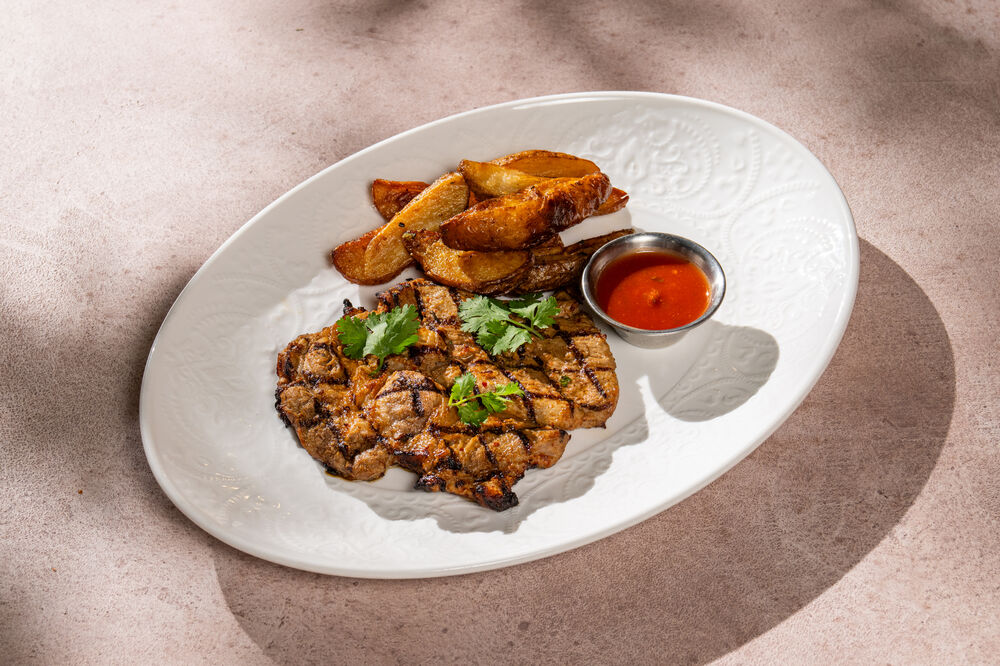 Pork chop with country-style potatoes