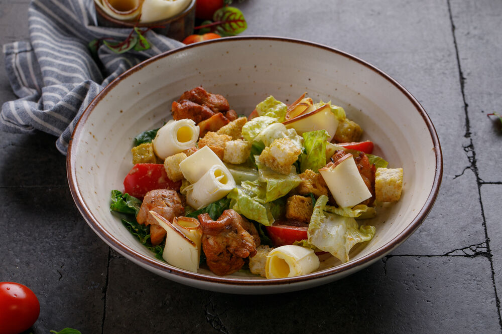 Warm salad with chicken and smoked Suluguni cheese