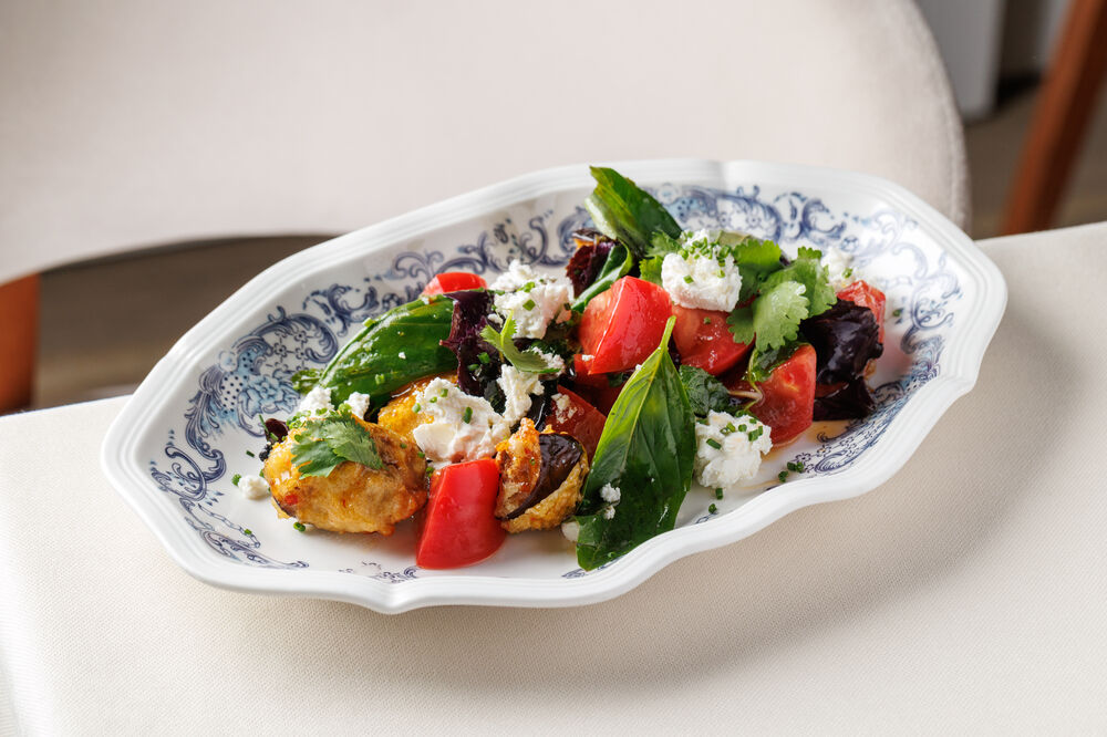 Salad with fried eggplant, tomatoes and smoked feta