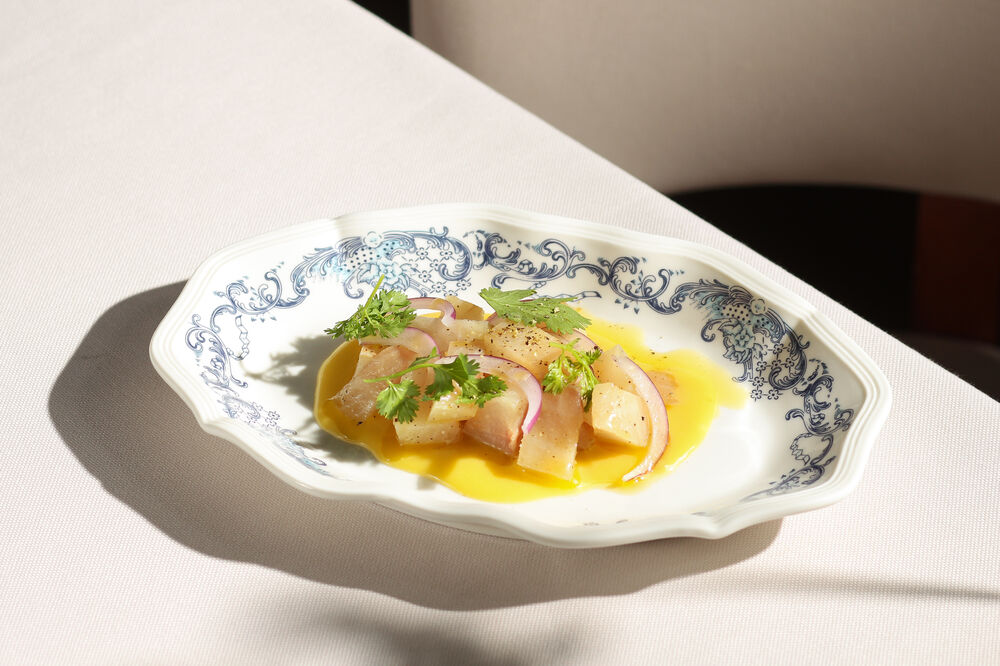 Muksun sugudai with yellow tomato sauce