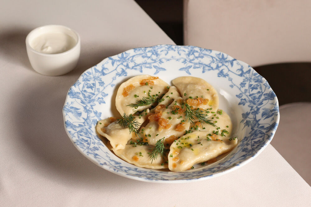 Vareniki with potatoes, mushrooms, and onions