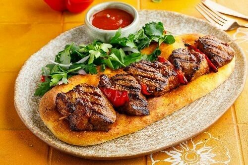 Lamb saddle on a spicy flatbread