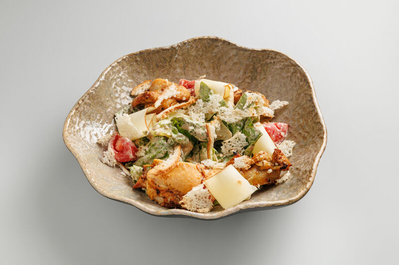 Salad with grilled chicken and smoked suluguni cheese