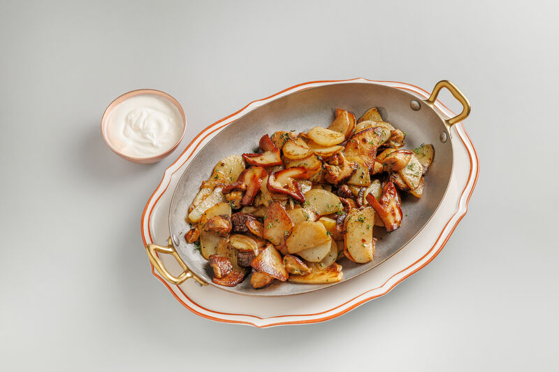 Fried potatoes with porcini mushrooms