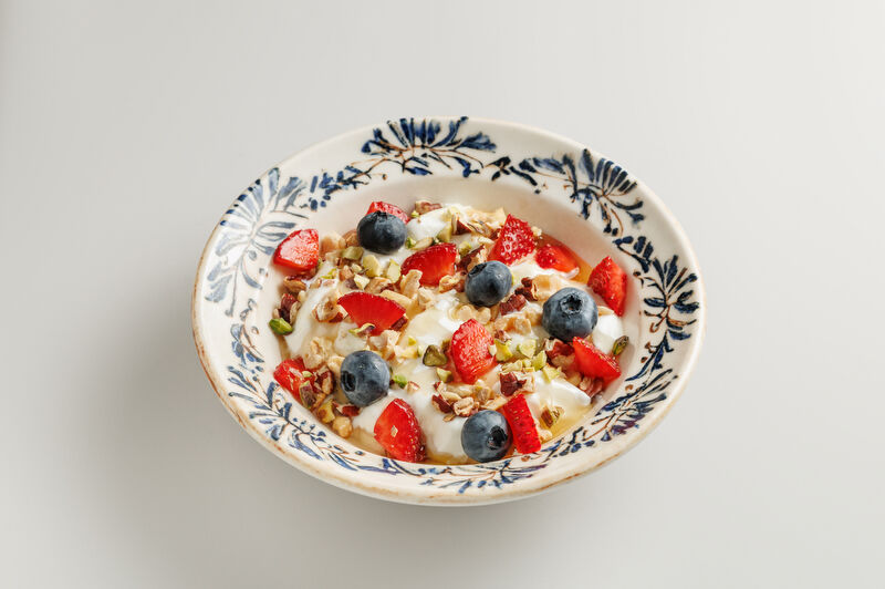 Matsoni with honey, nuts and seasonal berries