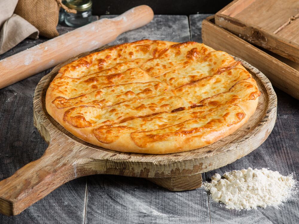 Khachapuri with smoked suluguni cheese