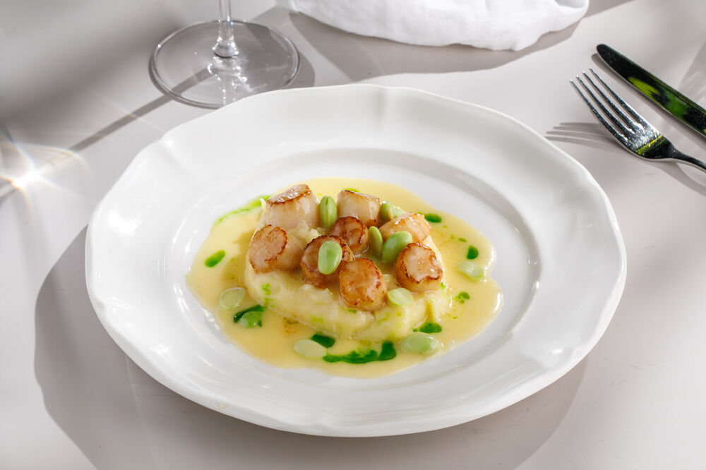 Scallops in cream sauce with edamame beans