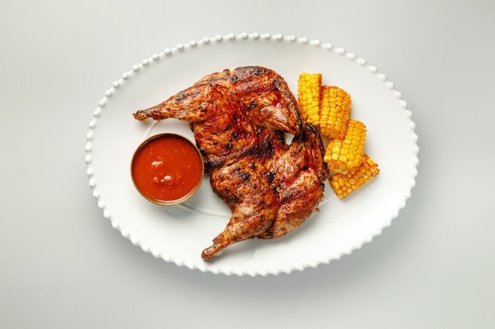 Запеченный цыпленок в аджике с кукурузой