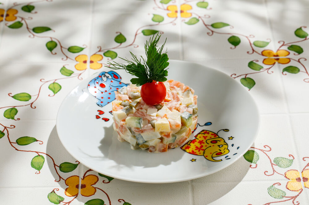 Children's Olivier salad with salmon