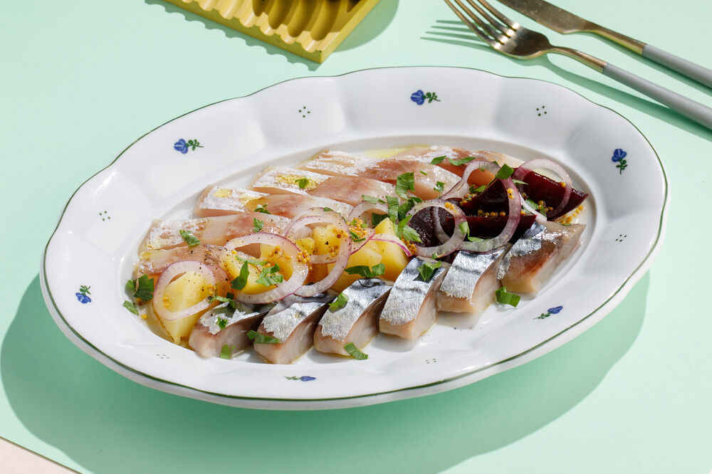 Assorted fish with baked vegetables