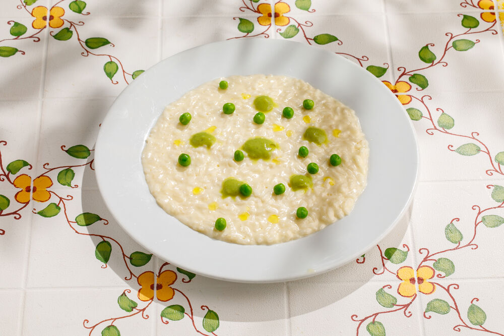 Children's cheese risotto with green peas and zucchini mousse