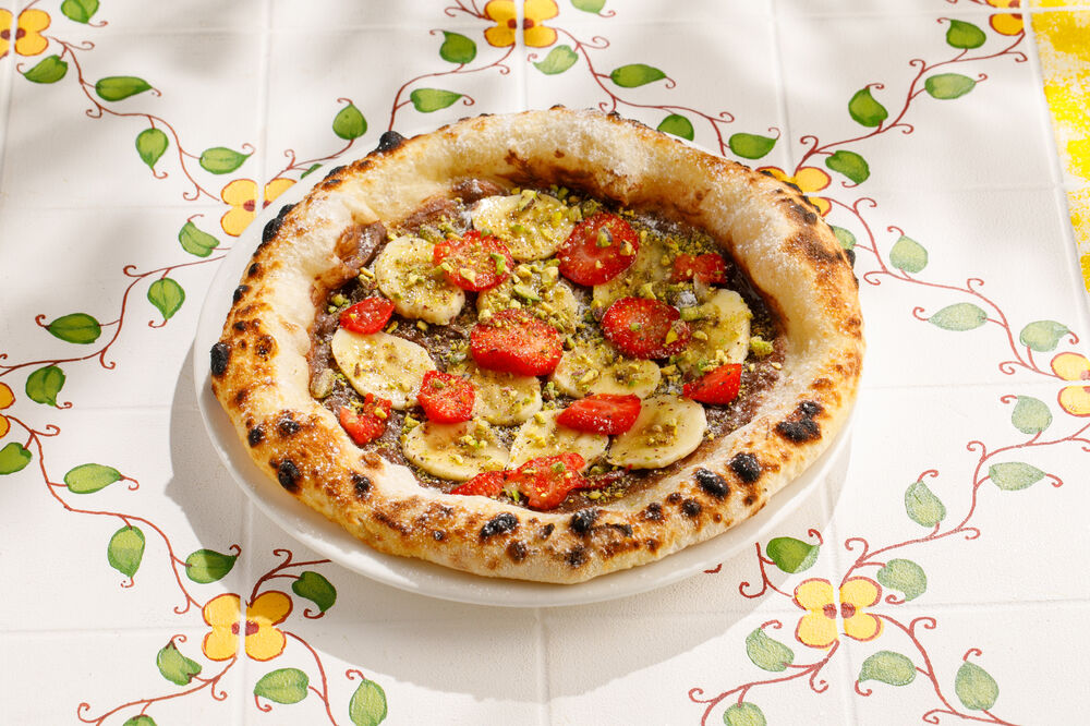 Kids' pizza with Nutella, banana, and strawberries