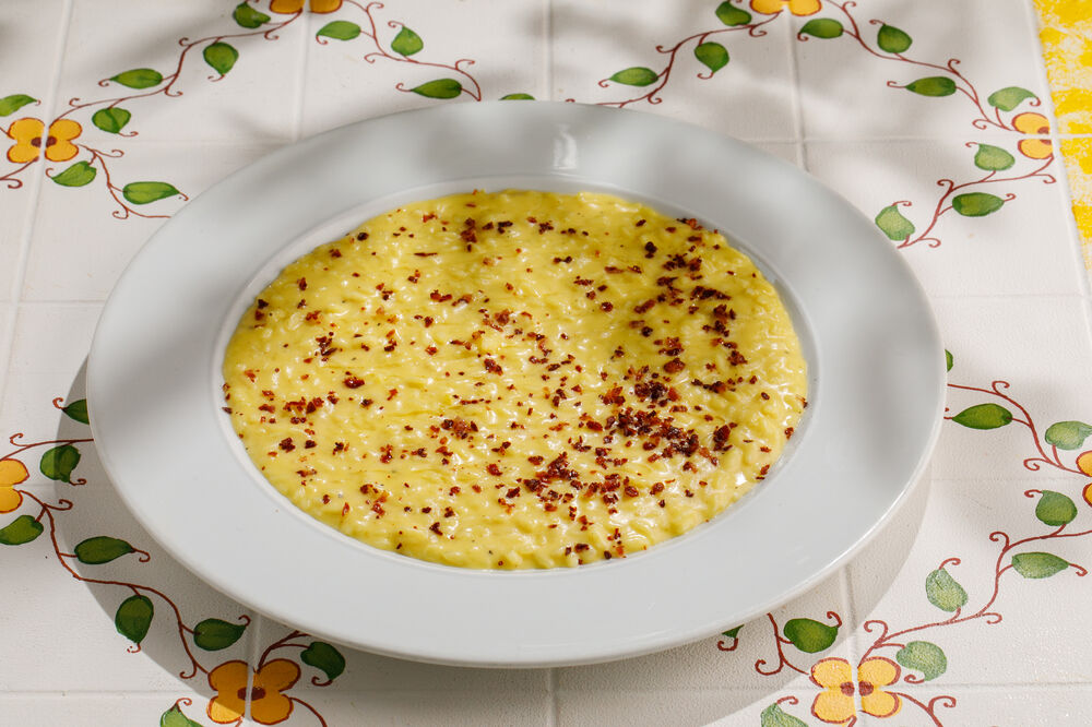Risotto with saffron and bacon crumbles