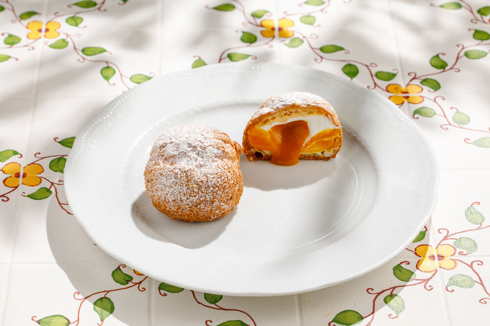 Choux bun with mango cream