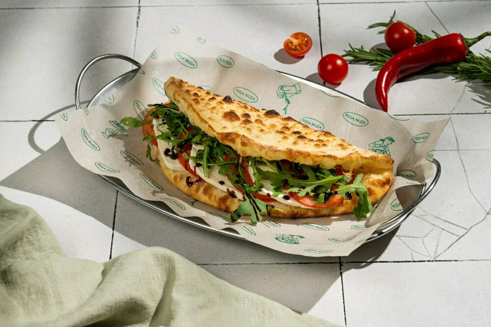 Panini with mozzarella and tomatoes