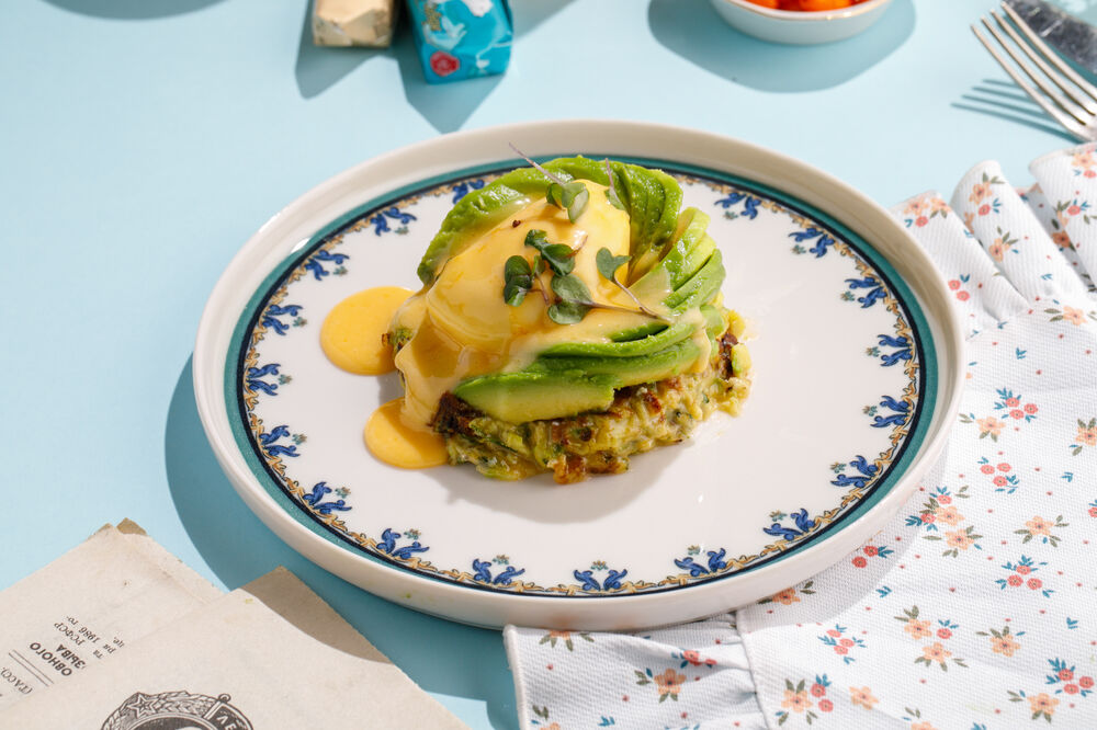 Zucchini pancake with avocado and poached egg