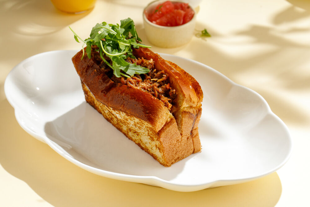 Brioche with veal cheeks and parmesan