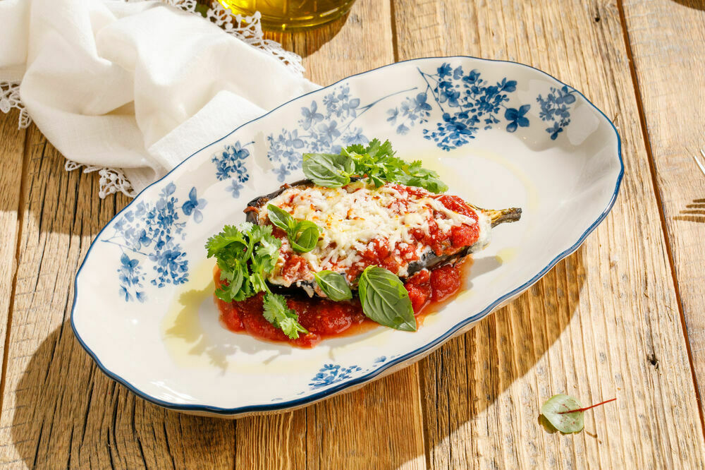 Baked eggplant Bolognese with suluguni