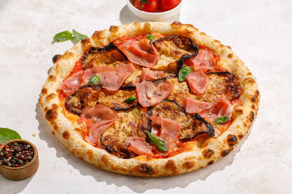Parmesan pizza with ham