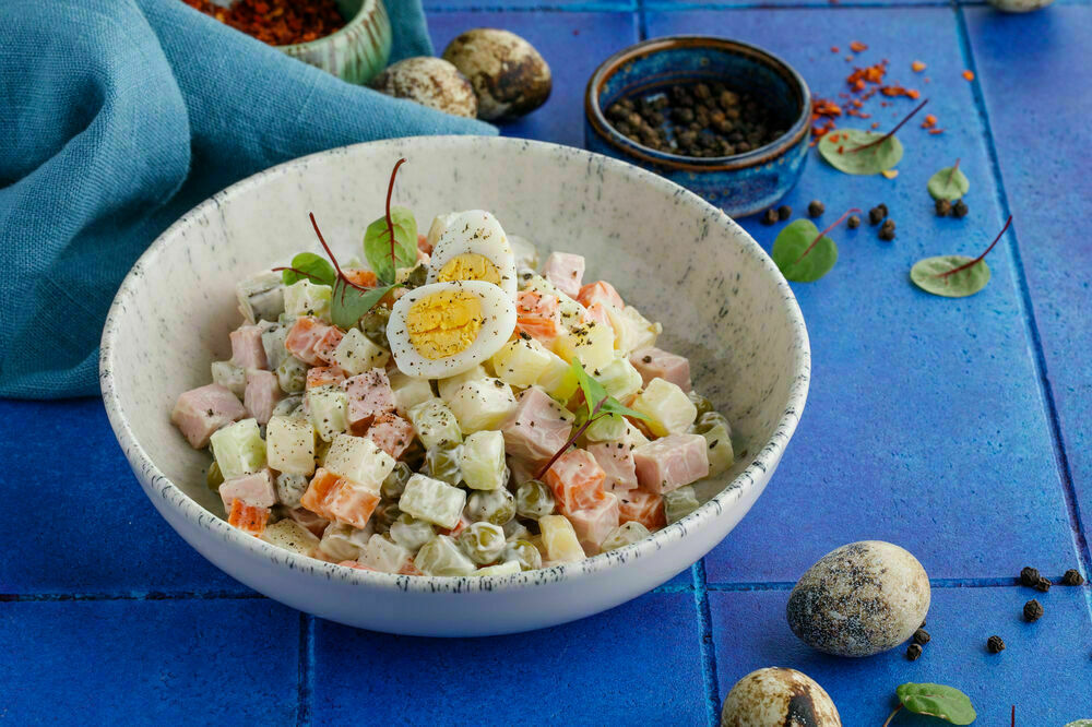 Olivier salad with sausage
