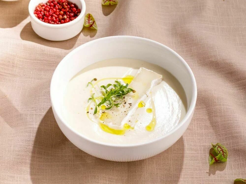 Creamy cauliflower soup with brie cheese