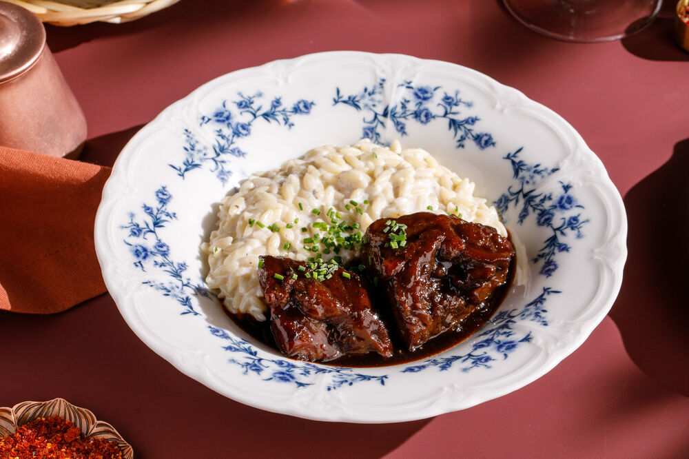 Stewed veal cheeks with truffle orzo
