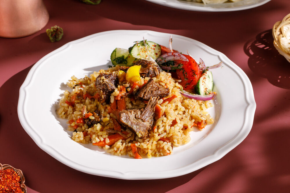 Uzbek pilaf with lamb and fresh vegetables