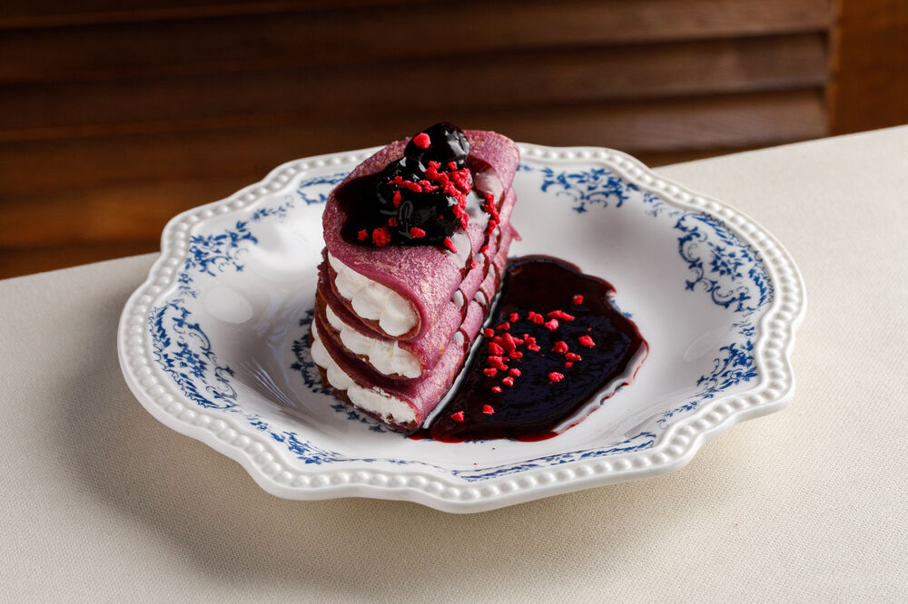 Pancakes with blueberries and buttercream