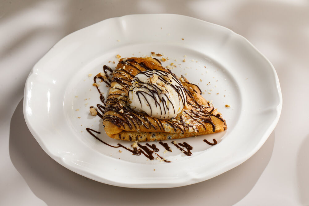 Pancake with poppy seeds and ice cream