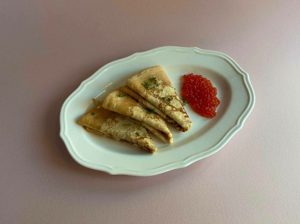 Pancakes with red caviar