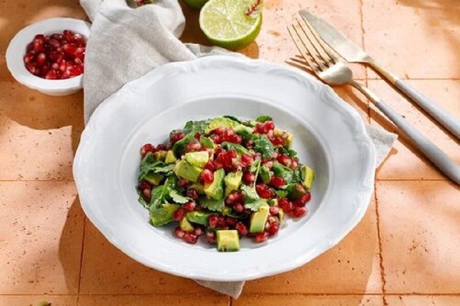 Salad with avocado and pomegranate