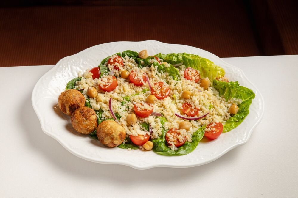 Salad with couscous and falafel