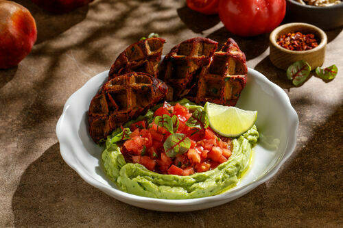 Guacamole with tomatoes and avocado