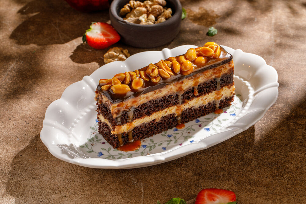 Chocolate cake with peanuts and caramel