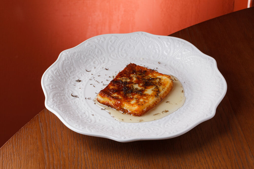 Fried halloumi with truffle honey and black truffle