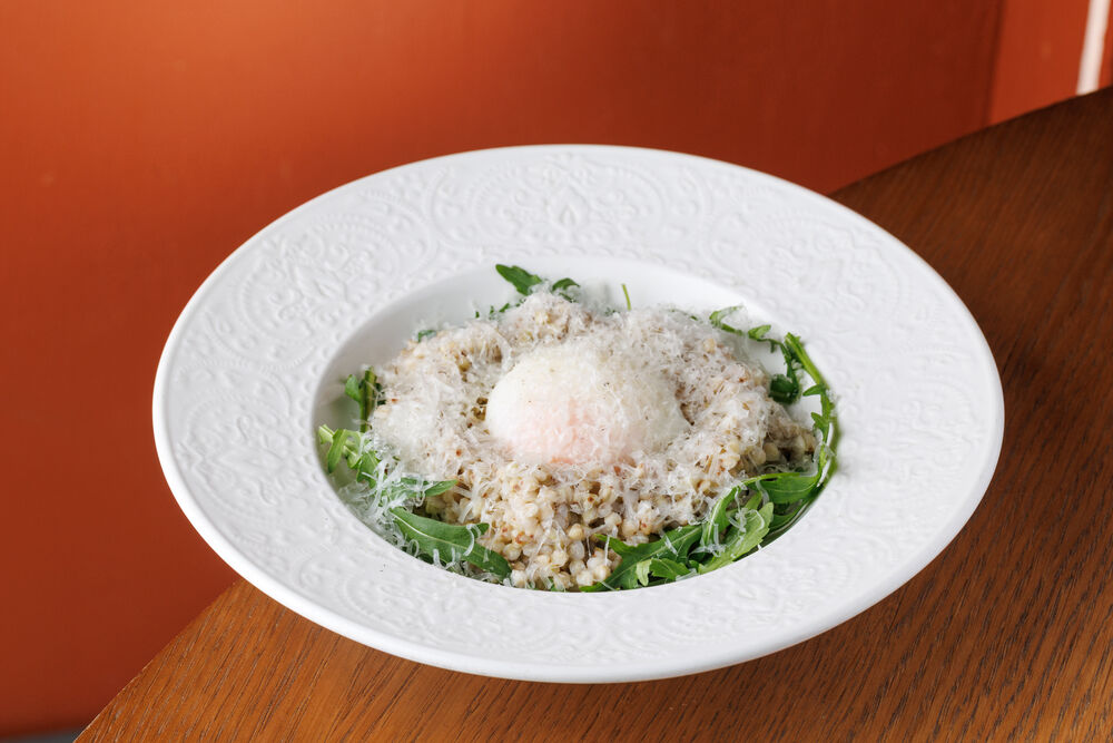 Green buckwheat with parmesan and poached egg