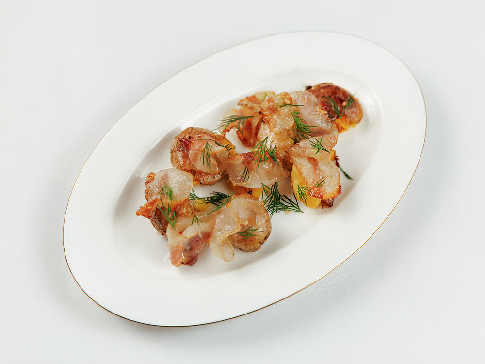 Fried potatoes with guanciale