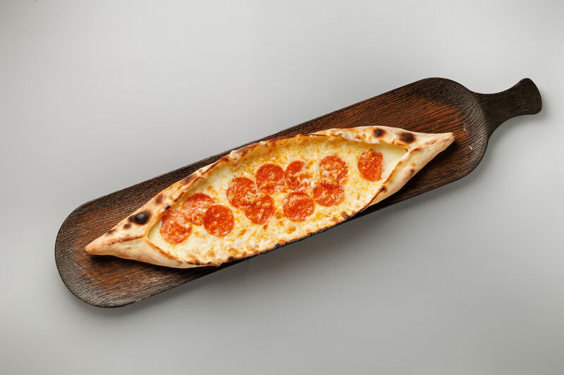 Pide with cheese and chorizo