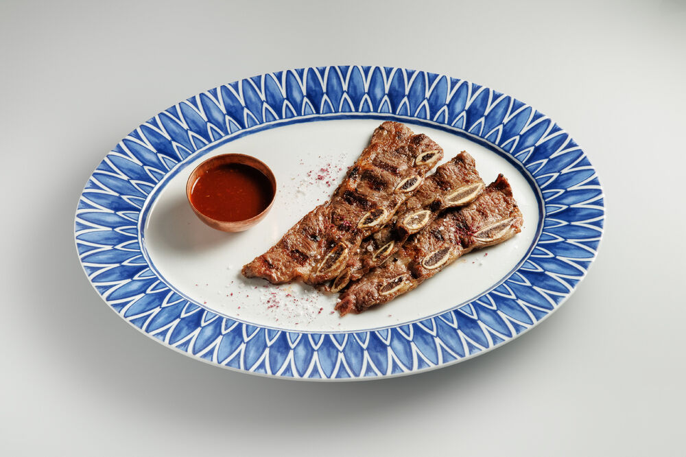 Bone-in marbled beef brisket with Black Sea sauce
