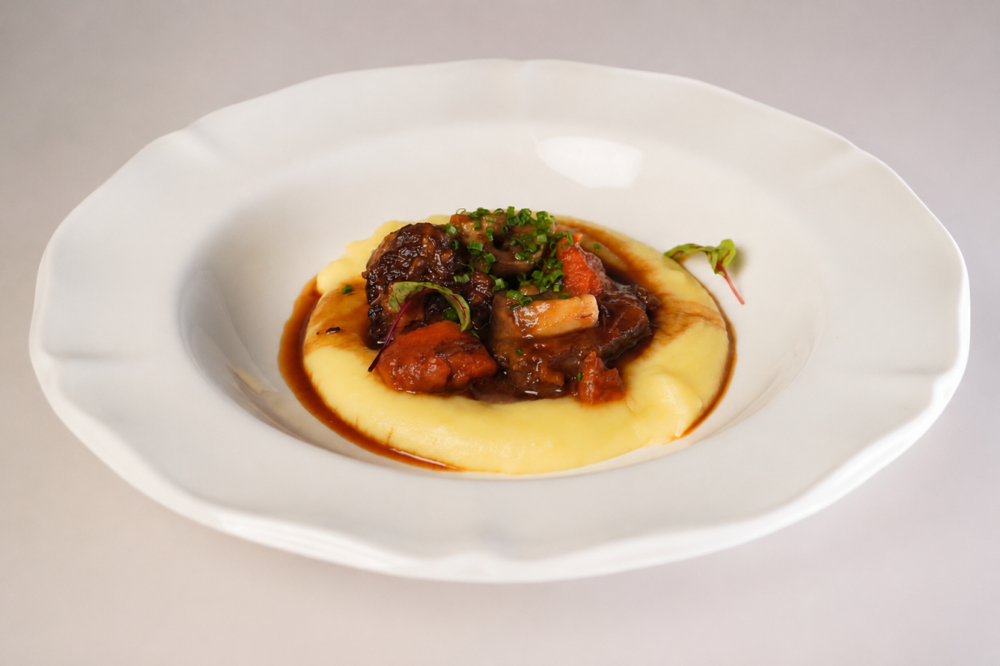 Stewed beef with vegetables and mashed potatoes