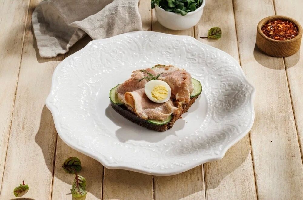 Тoast on Borodinsky bread with boiled pork and cucumber