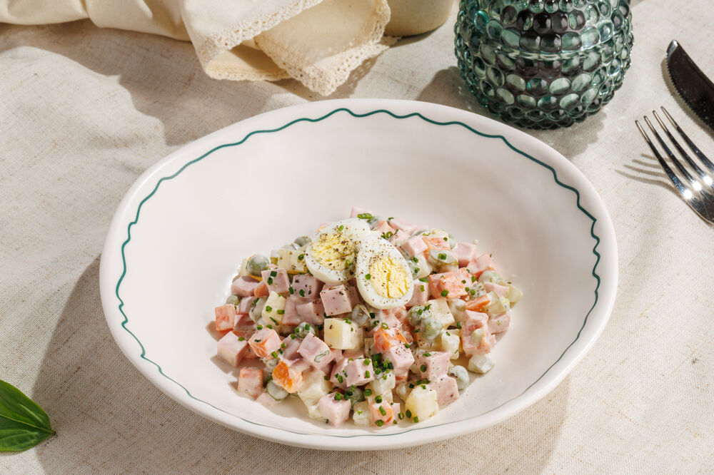 Olivier salad with sausage