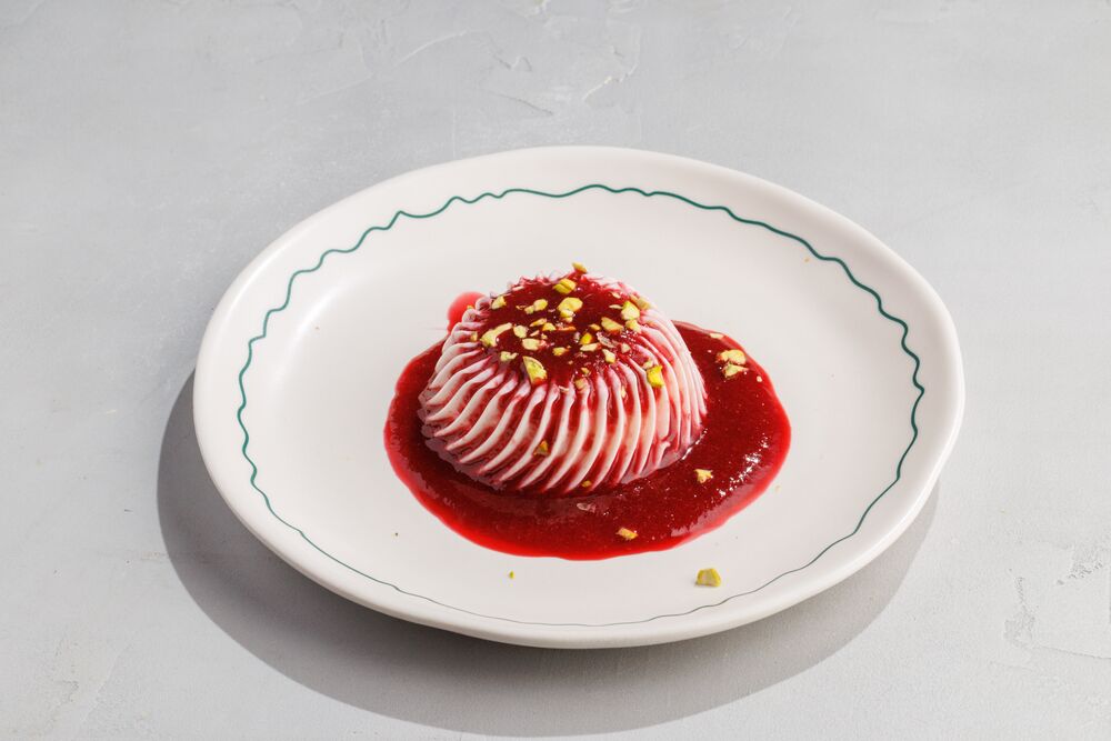 Berry panna cotta with pistachio crumbs