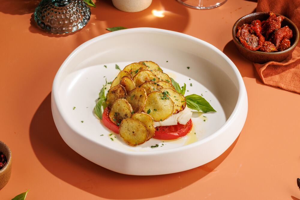 Perch with tomatoes and potatoes