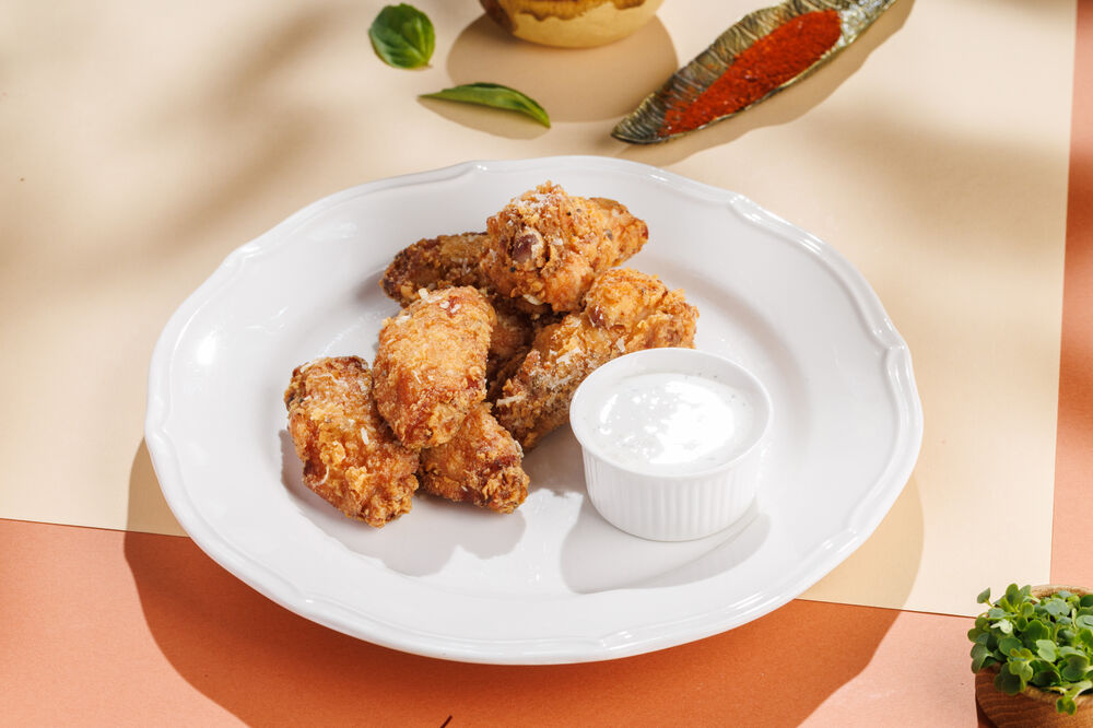 Куриные крылья с пармезаном и чесноком