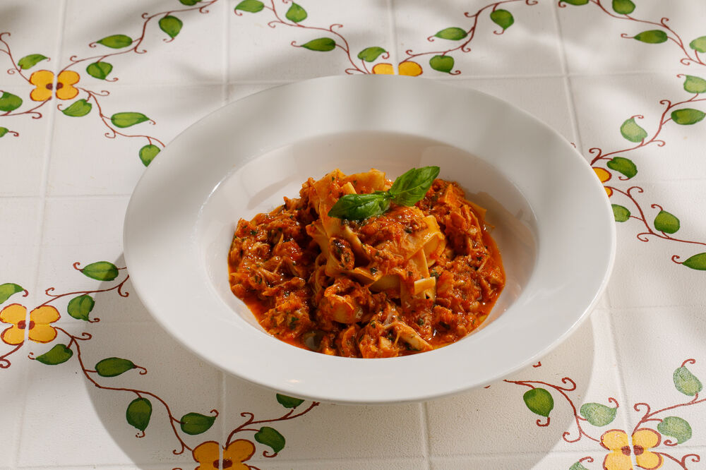 Fettuccine with rabbit ragout and black olives